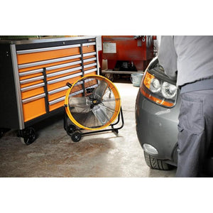 GEARWRENCH GWSFAN24 shop fan in use in a garage